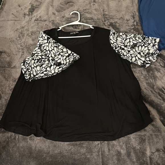 Black Top with Floral Sleeves - Picture 1 of 1